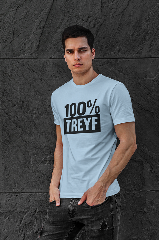 Man wearing a light blue t-shirt with '100% TREYF' text against a dark stone wall.