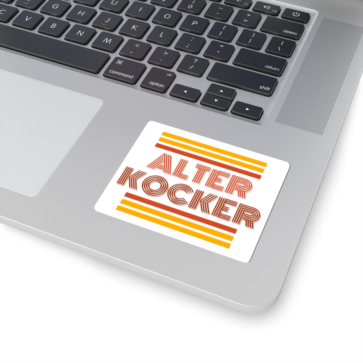 Laptop with a 'Alter Kocker' sticker on the palm rest area