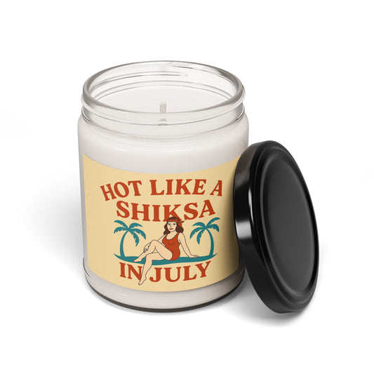 Candle with a 'hot like a shiksa' label on a white background