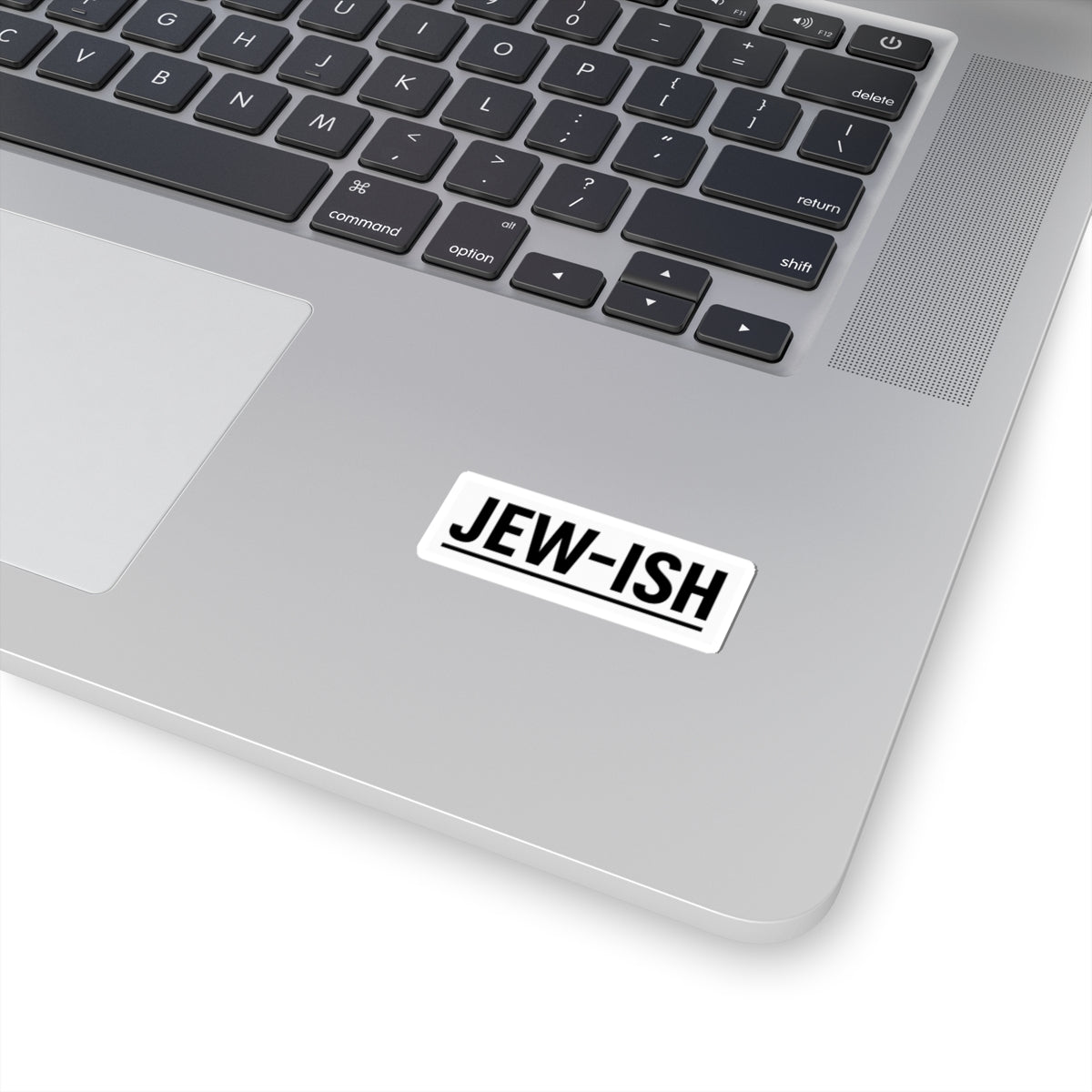 Laptop with a 'JEW-ISH' sticker on the palm rest area