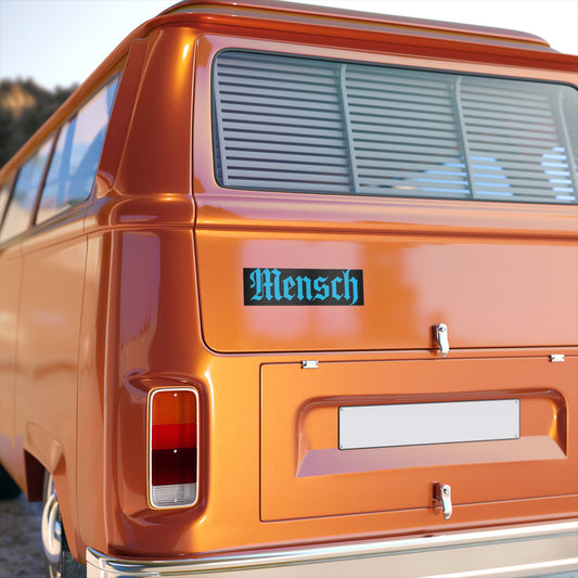 Orange van with 'Mensch' sticker on a clear day