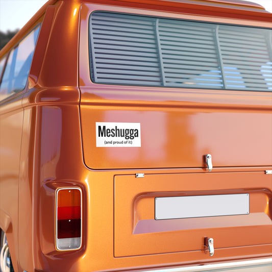 Orange vehicle with a 'Meshugga' sticker on the back