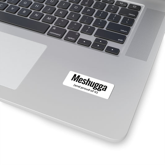 Laptop with a 'Meshugga (and proud of it)' sticker on the palm rest area.