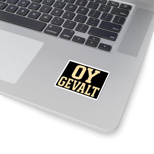 Laptop with a 'OY GEVALT' sticker on the palm rest area