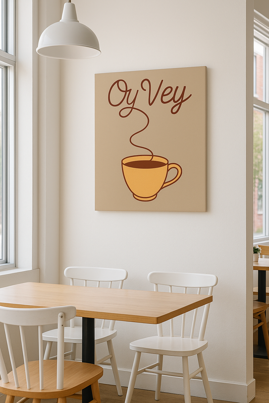 Dining area with a table and chairs, wall art of a coffee cup and text 'Oy Vey' on a beige background.