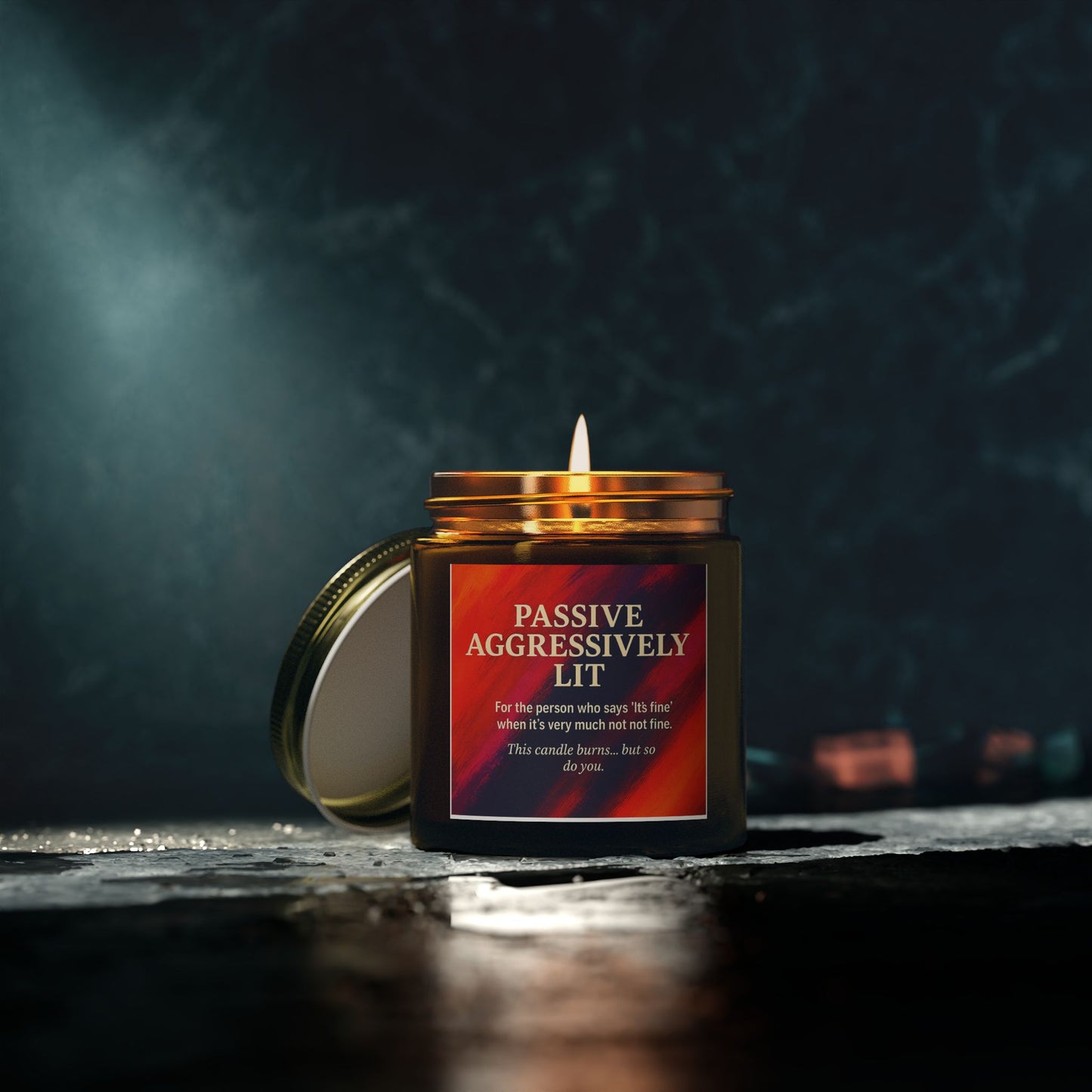Candle in a jar with a humorous label on a dark background