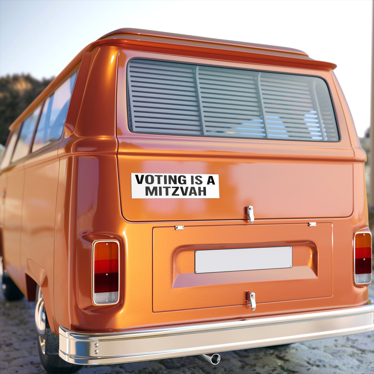 Orange van with a 'Voting is a Mitzvah' sticker on the back