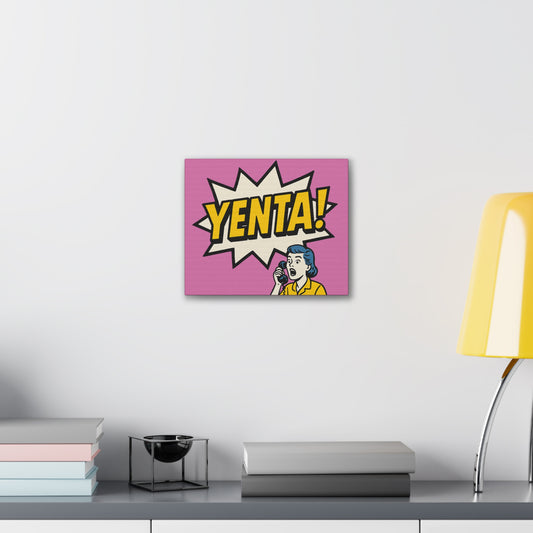 Canvas print with 'Yenta!' design on a pink background, displayed on a wall above a desk.