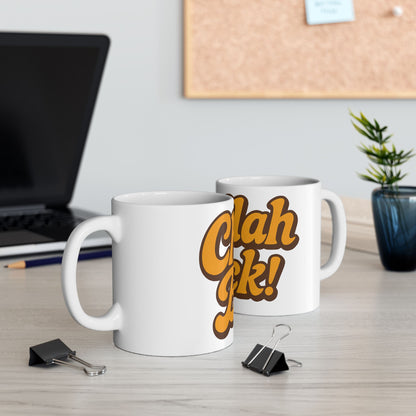 Two white mugs with 'Challah Back!' printed on them on a desk with office supplies.
