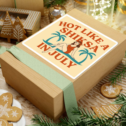 Wooden gift box with a humorous label on a festive background