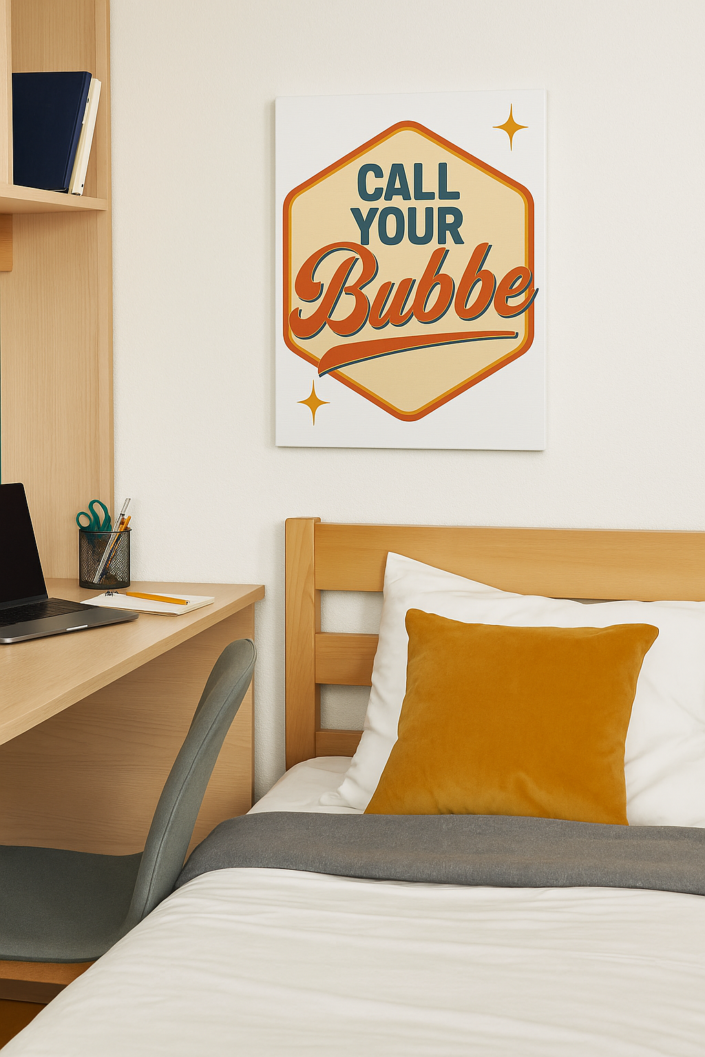 Bedroom with a desk and 'Call Your Bubbe' poster on the wall