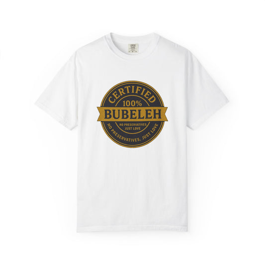 White tee featuring a round golden seal design that reads 'Certified 100% Bubeleh'.
