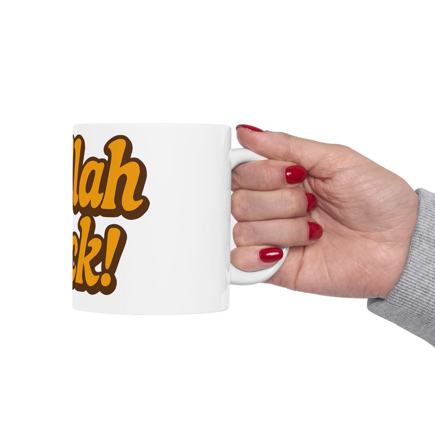 Hand holding a white mug with 'challah back' text in yellow and brown on a white background