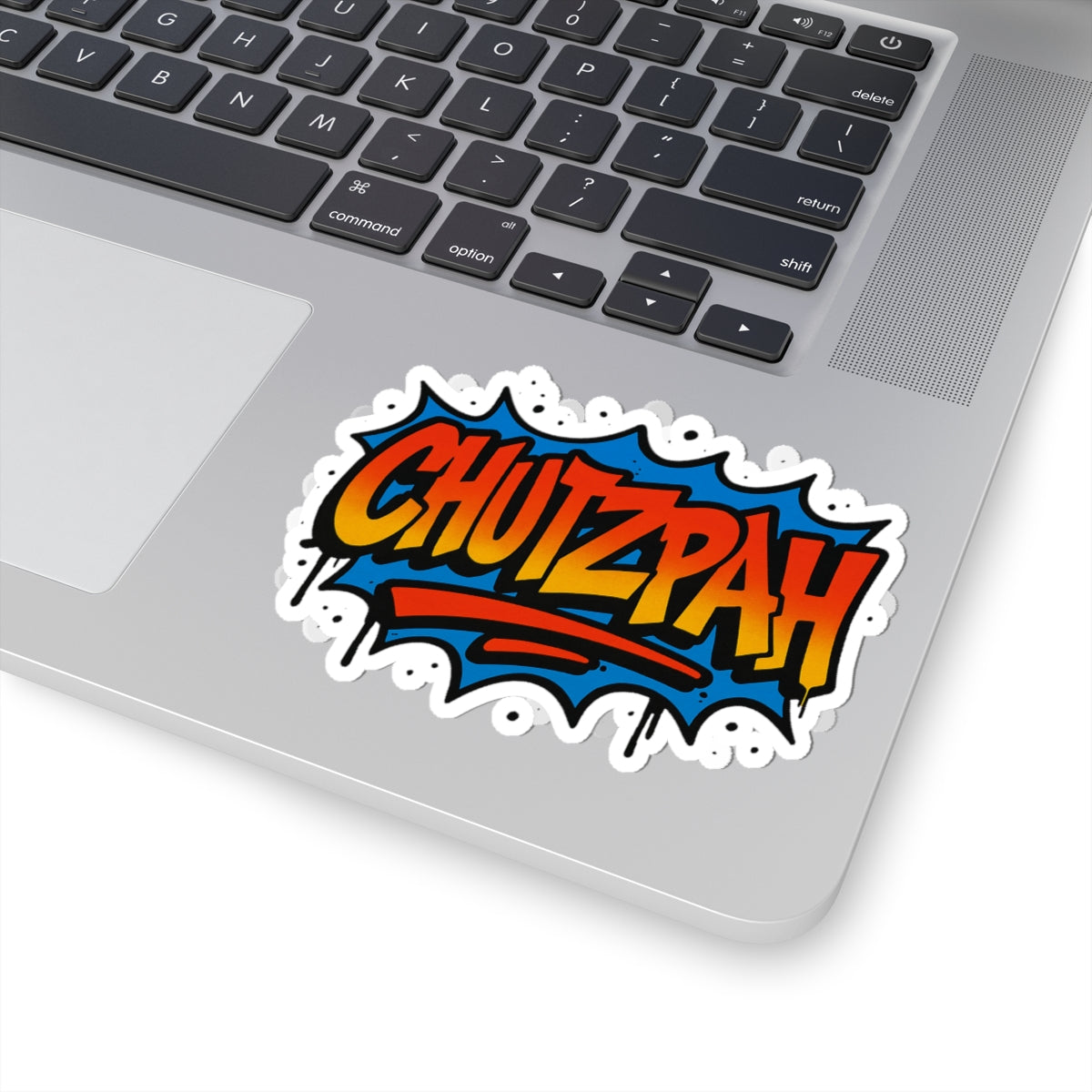 Laptop with a 'Chutzpah' sticker on the palm rest area