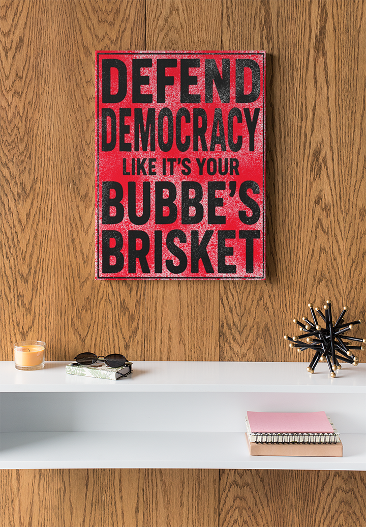 Red and black sign with text on a wooden wall