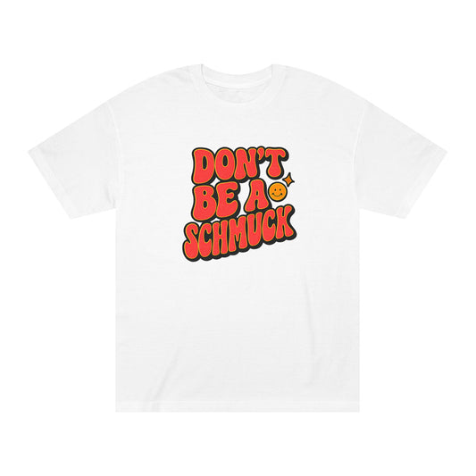 White t-shirt with red and black text 'DON'T BE A SCHMUCK' on a white background
