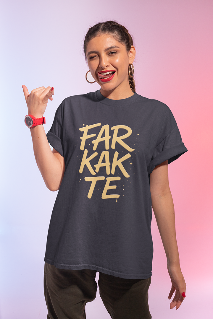 Woman wearing a dark gray t-shirt with 'FARKAKTE' text on a gradient background