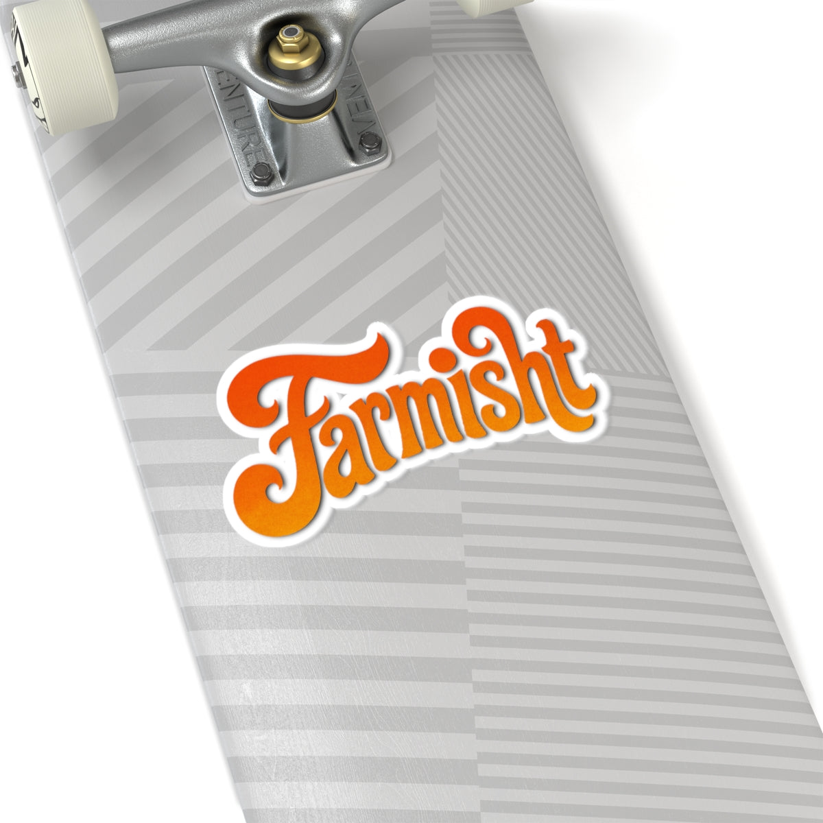 Close-up of a skateboard deck with 'Farmish' logo on a white background