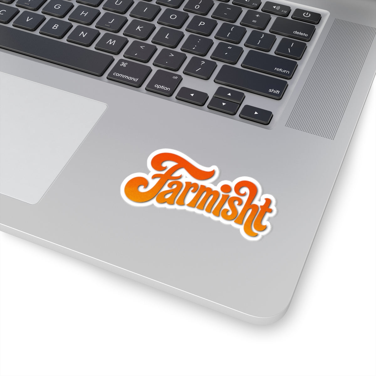 Laptop with a 'Farmish' sticker on the palm rest area