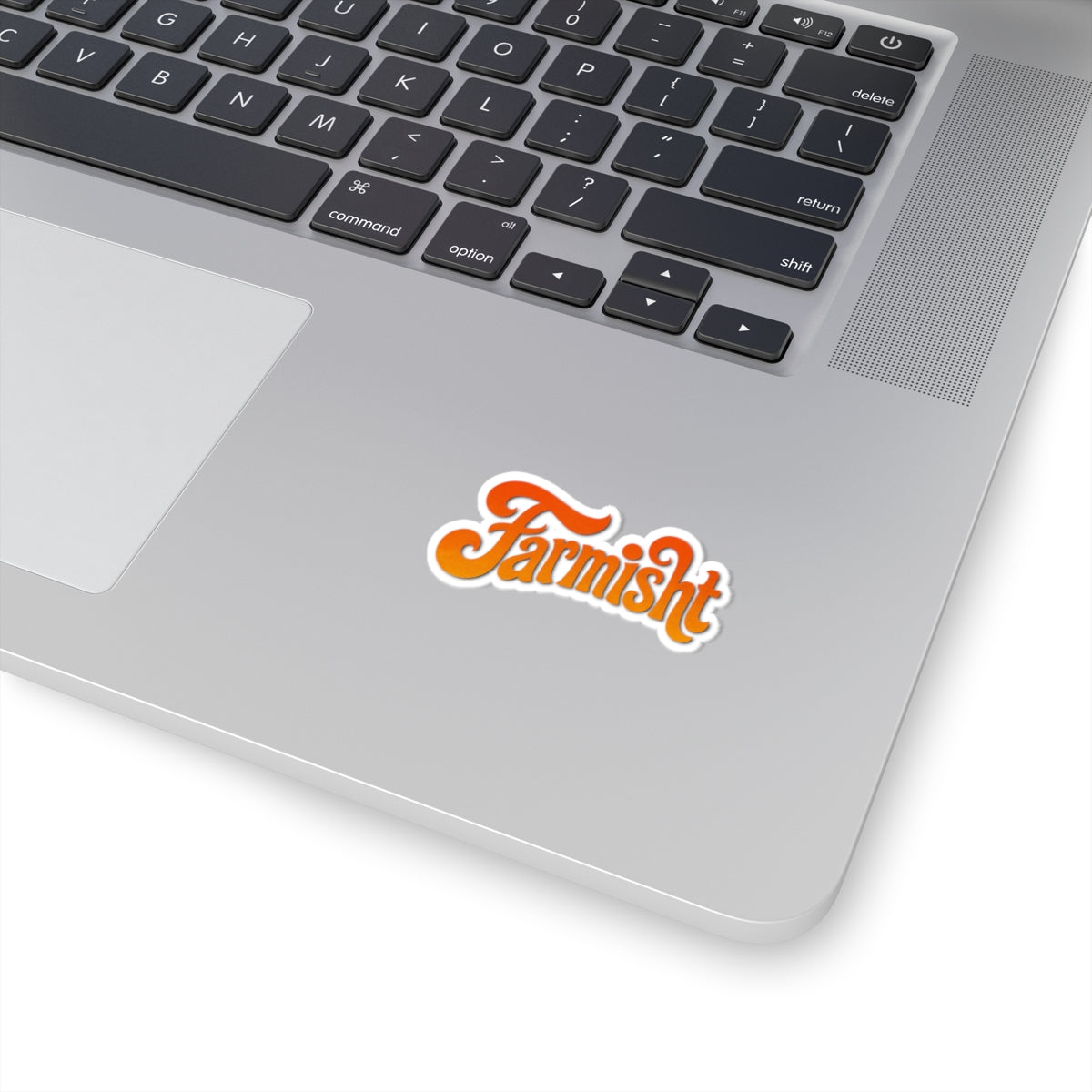 Laptop with a 'Farmish' sticker on the palm rest area