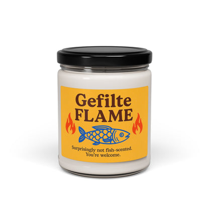 Jar of 'Gefilte Flame' candle with a yellow label on a white background