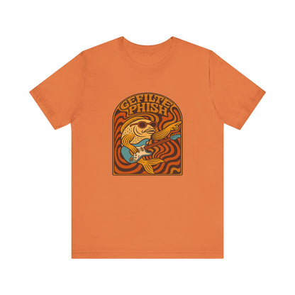 Orange t-shirt with a graphic design of a fish and text on a white background