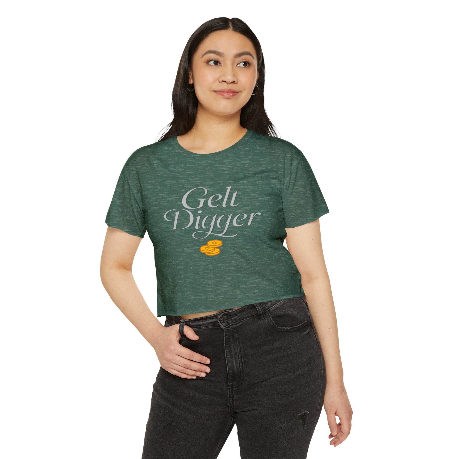 Woman wearing a green t-shirt with 'Gelt Digger' text on a white background