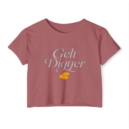 Pink t-shirt with 'Gelt Digger' text and gold coin graphics on a white background