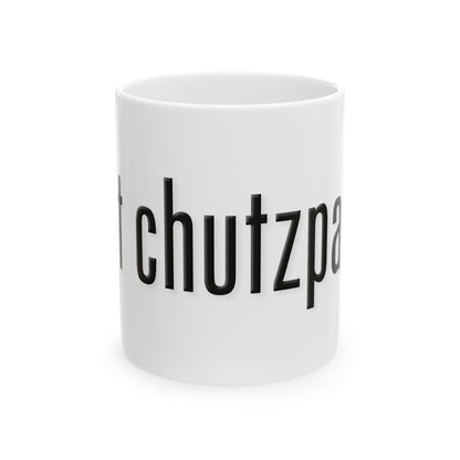 White mug with black text spelling 'got chutzpah?' on a white background