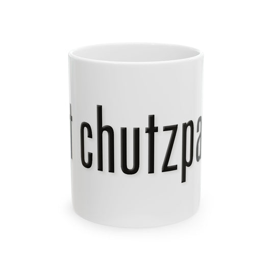 White mug with black text spelling 'got chutzpah?' on a white background