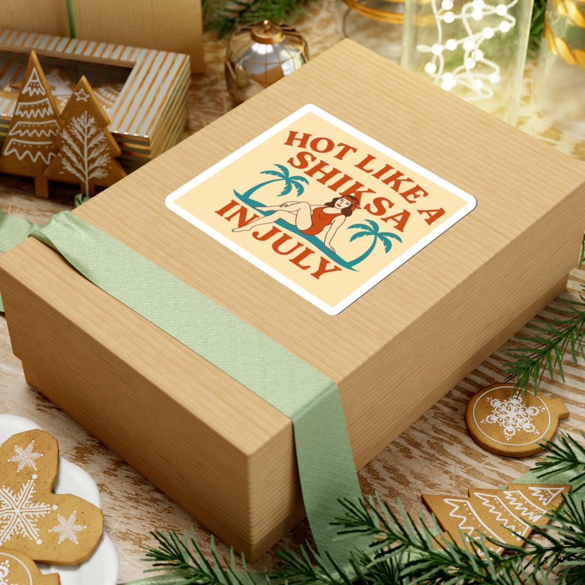 Wooden gift box with a humorous sticker on a festive background