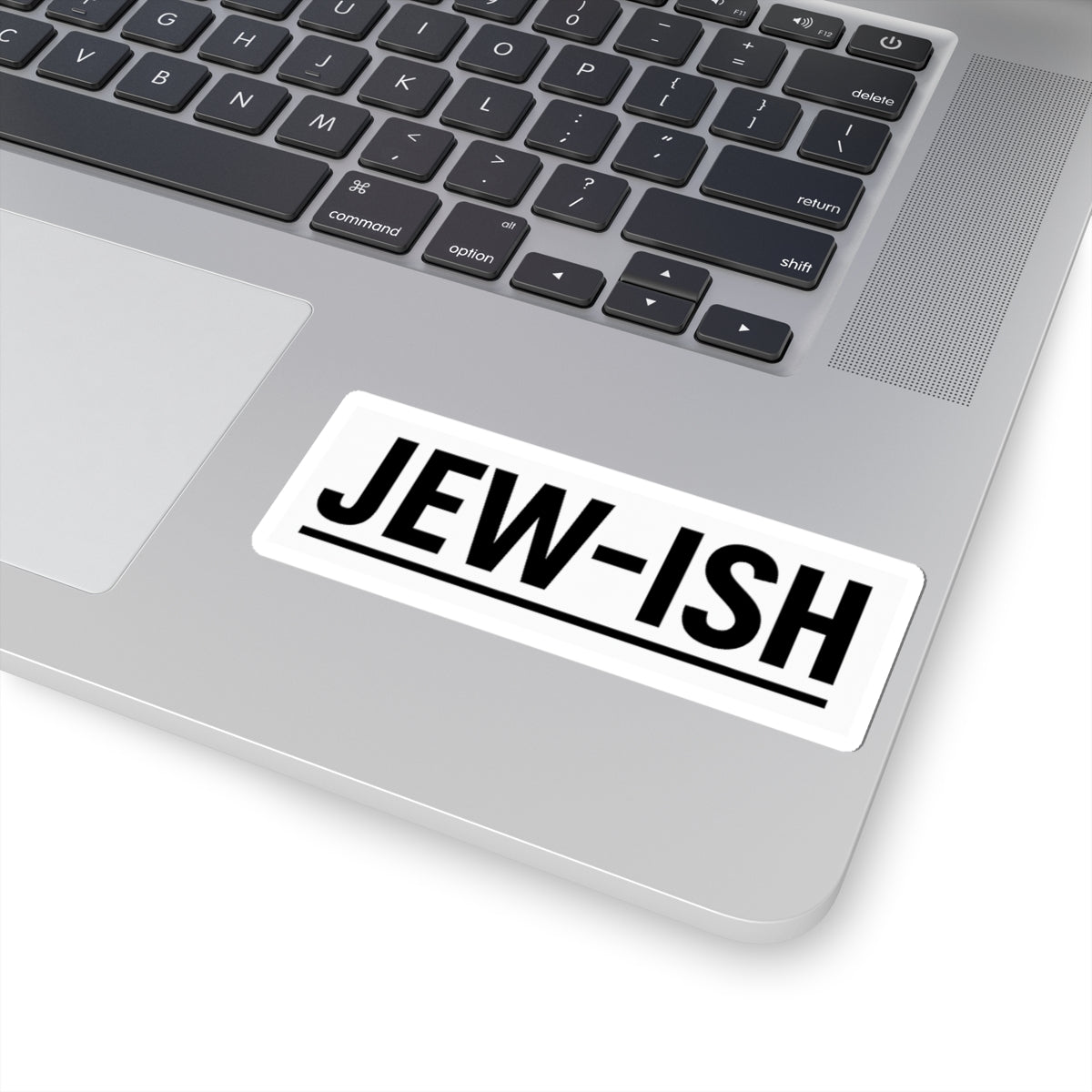 Laptop with a 'JEW-ISH' sticker on the palm rest area