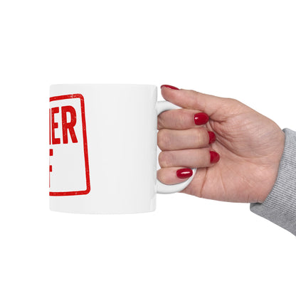 Hand holding a white mug with 'kosher af' in red text on a white background