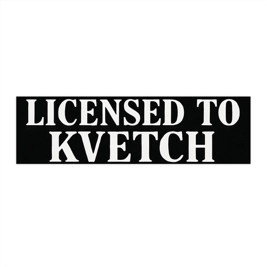 Black rectangular sticker with white text 'LICENSED TO KVETCH' on a white background
