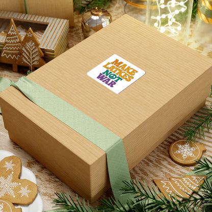 Wooden gift box with a colorful 'make latkes not war' sticker on a festive background with cookies and lights