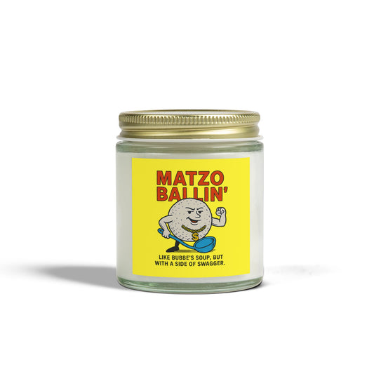 Candle jar with a yellow label featuring a cartoon character and text on a white background
