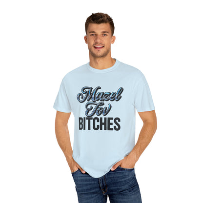 Man wearing a light blue t-shirt with text, standing against a white background