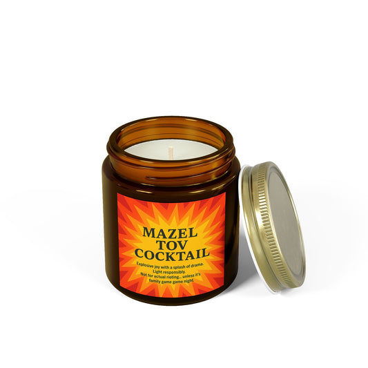 Candle in an amber jar with a colorful label on a white background