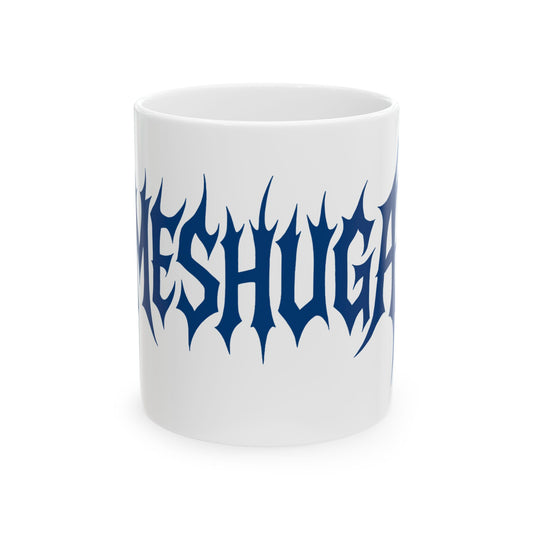 White mug with blue 'meshuga' text on a white background