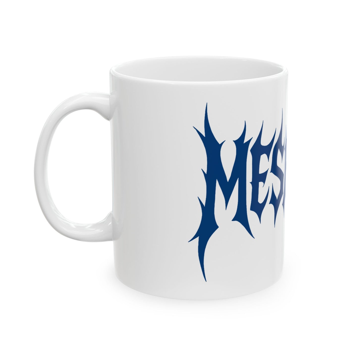 White mug with blue 'meshuga' design on a white background