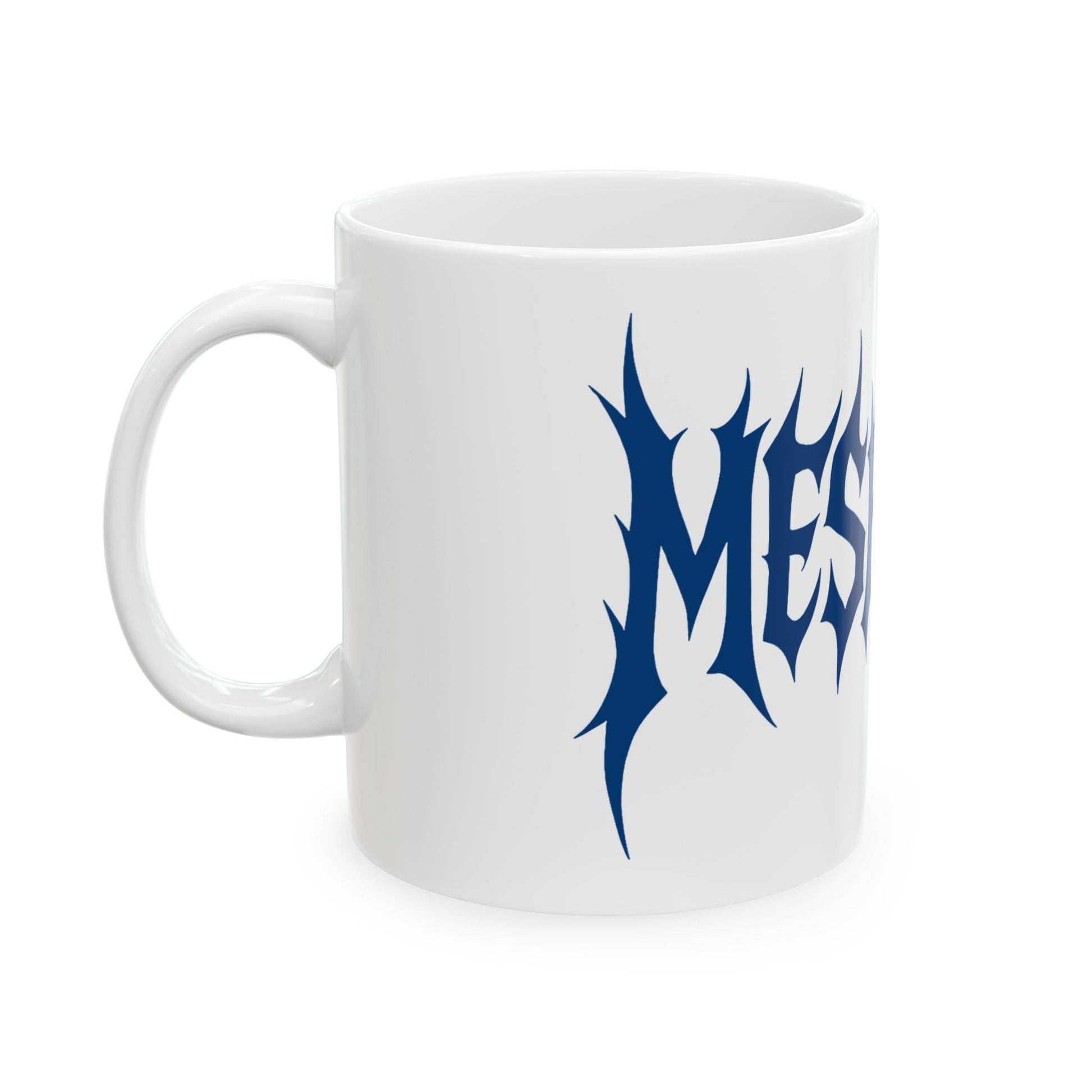 White mug with blue 'meshuga' design on a white background