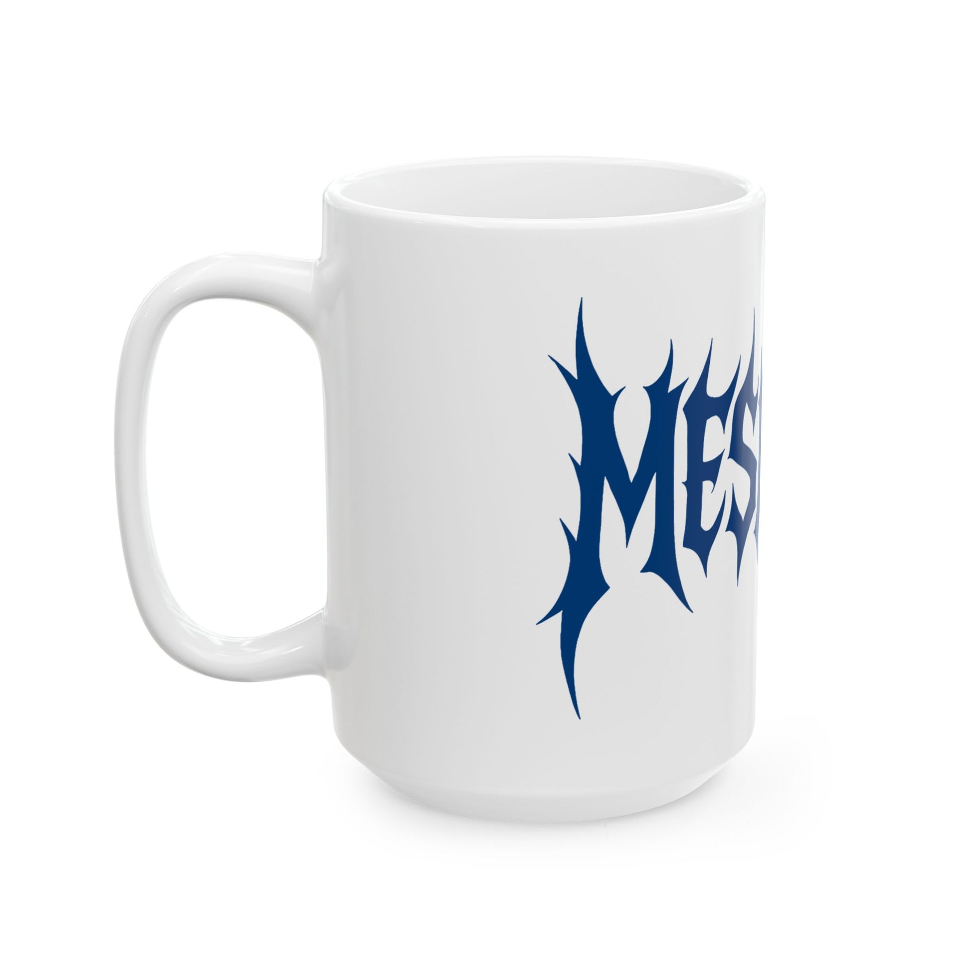White mug with blue 'meshuga' design on a white background
