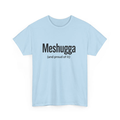 Light blue t-shirt with black text 'Meshugga (and proud of it)' on a white background