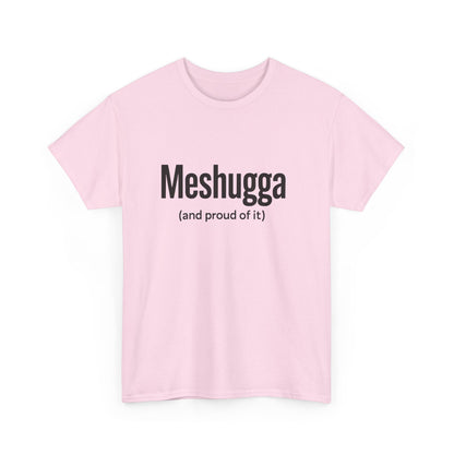 Pink t-shirt with black text 'Meshugga (and proud of it)' on a white background