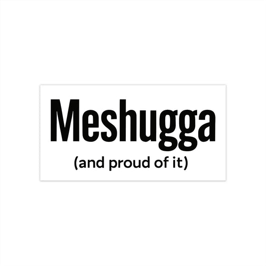 Sticker with the text 'Meshuggga (and proud of it)' on a white background