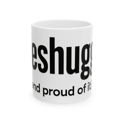 White mug with black 'meshugga' text on a white background