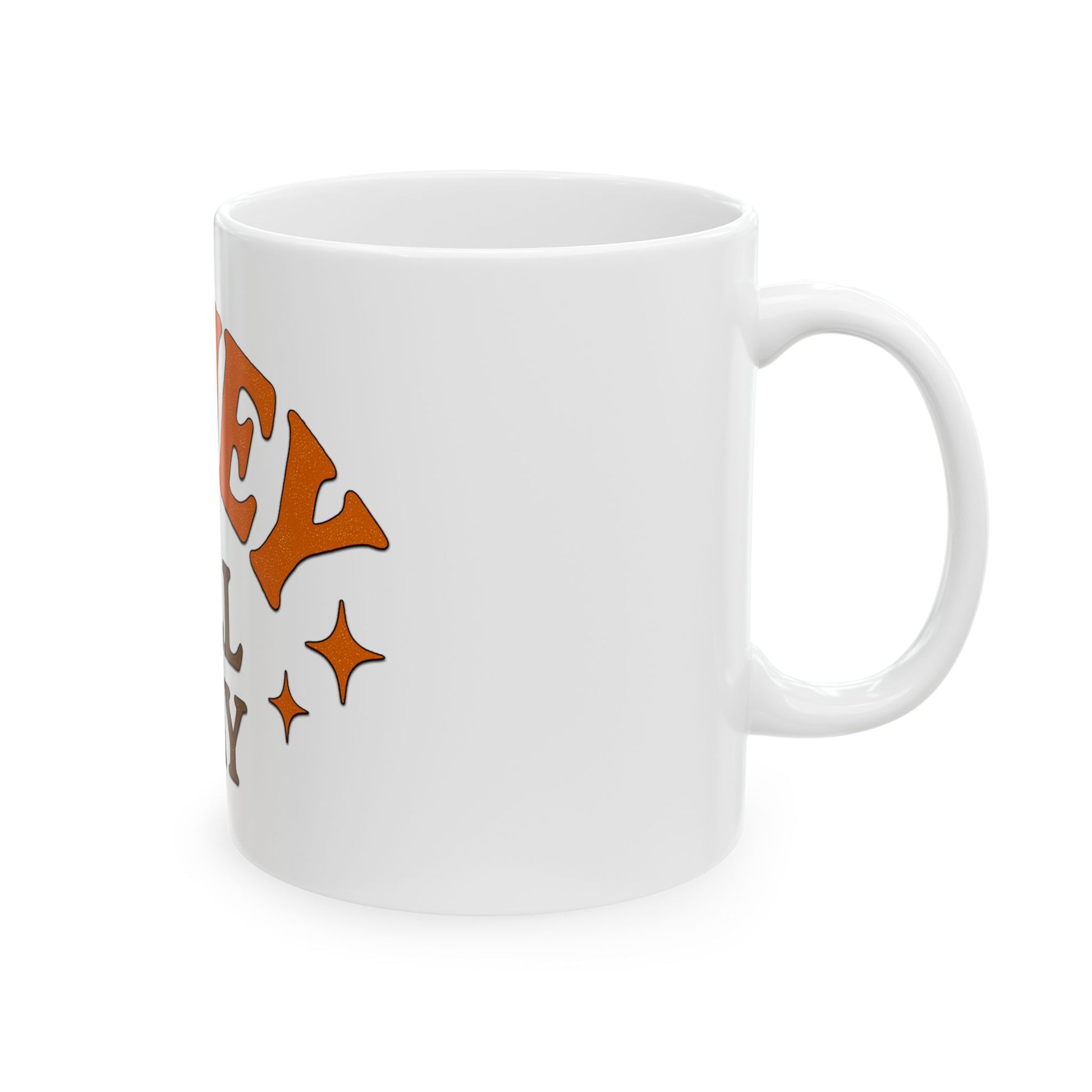 White mug with orange text and star designs on a white background
