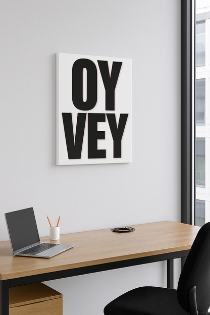 Modern office setup with 'OY Vey' artwork on the wall