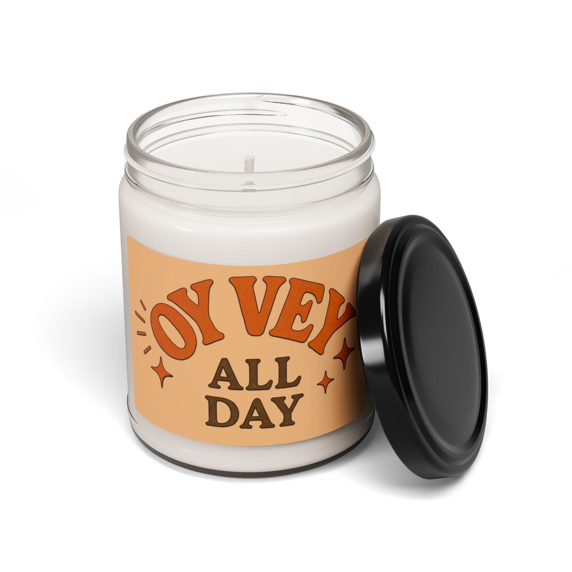 Candle with a 'Oy Vey All Day' label on a white background