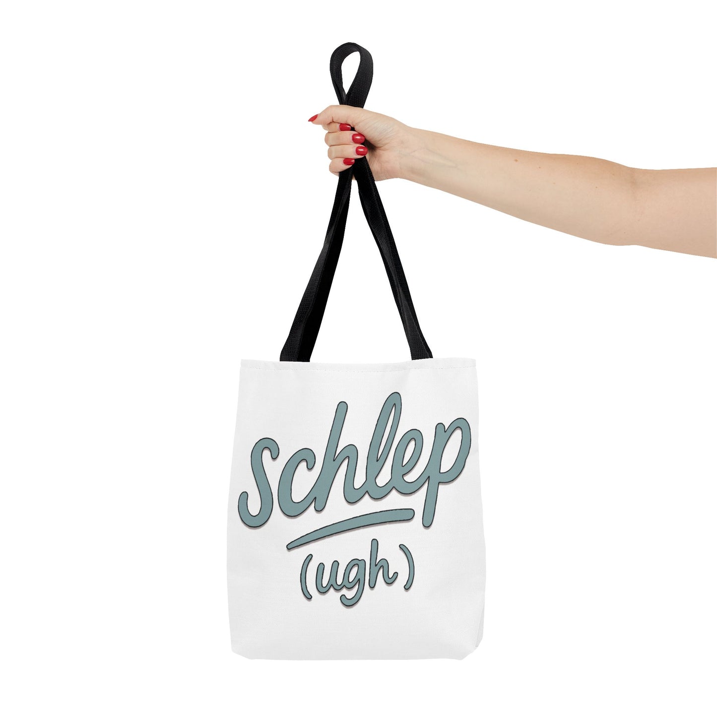 Tote bag with 'Schlep (ugh)' text held by a hand on a white background